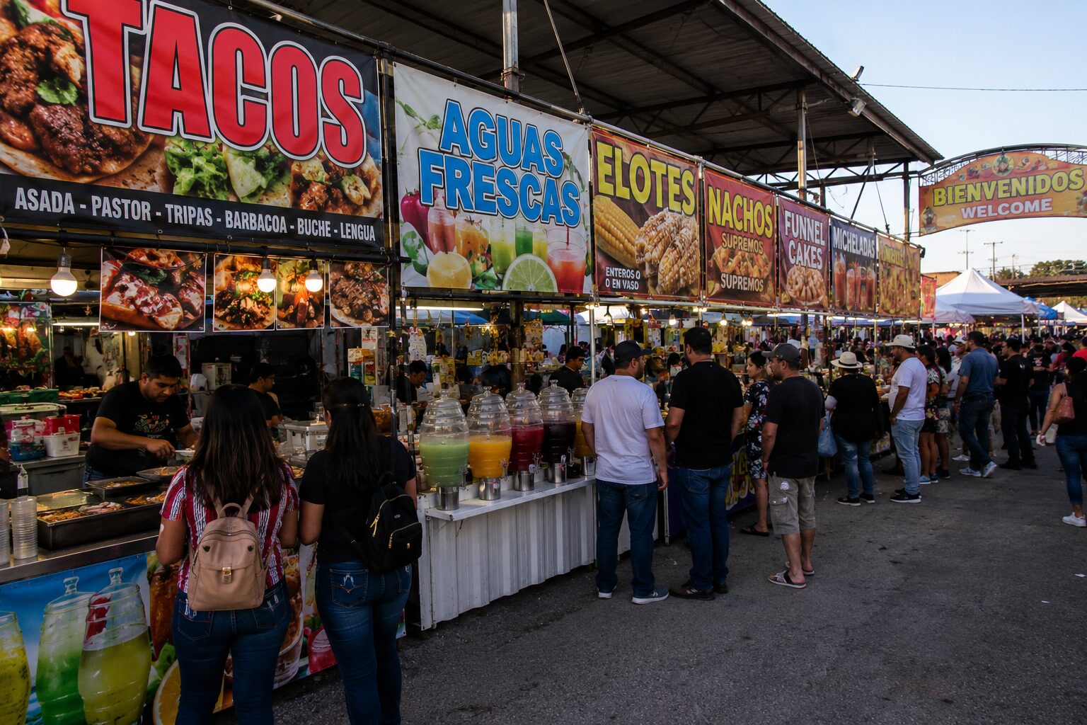 Texas flea market food vendors selling tacos roasted corn and aguas frescas